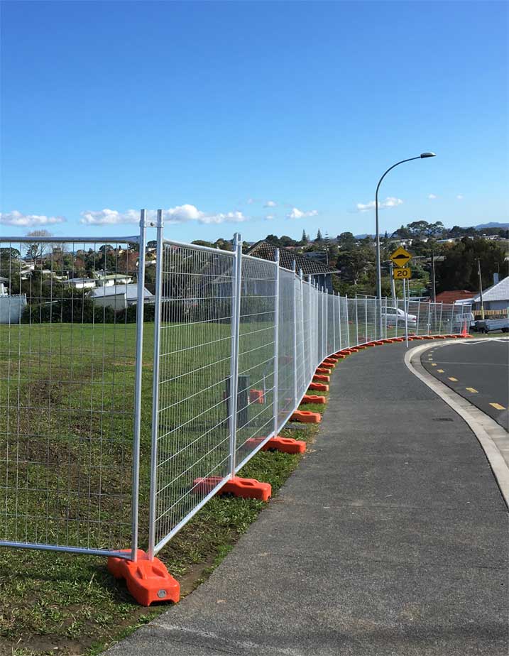 Temporary fencing set up around an empty section